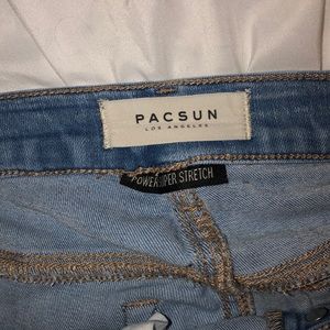 Light blue ripped jeans